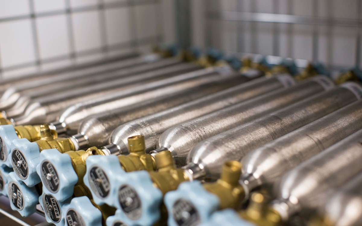 Industrial gas cylinders piled on top of each other