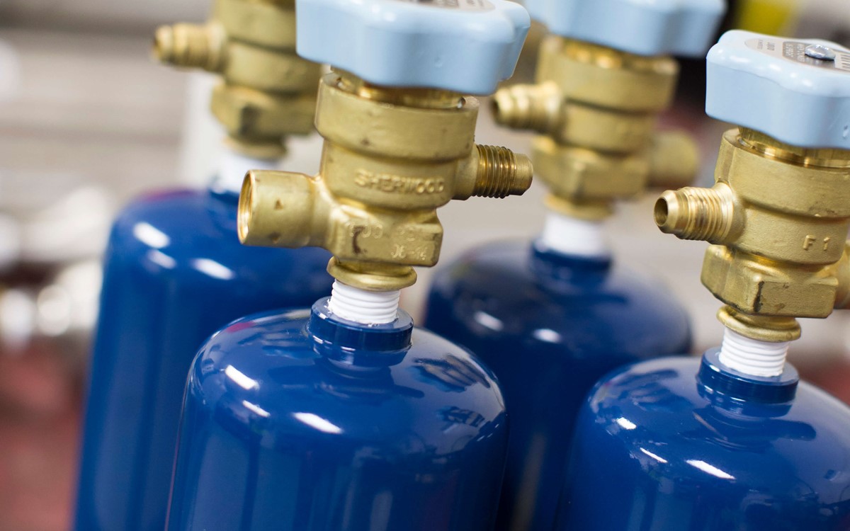 Close up image of small gas cylinders