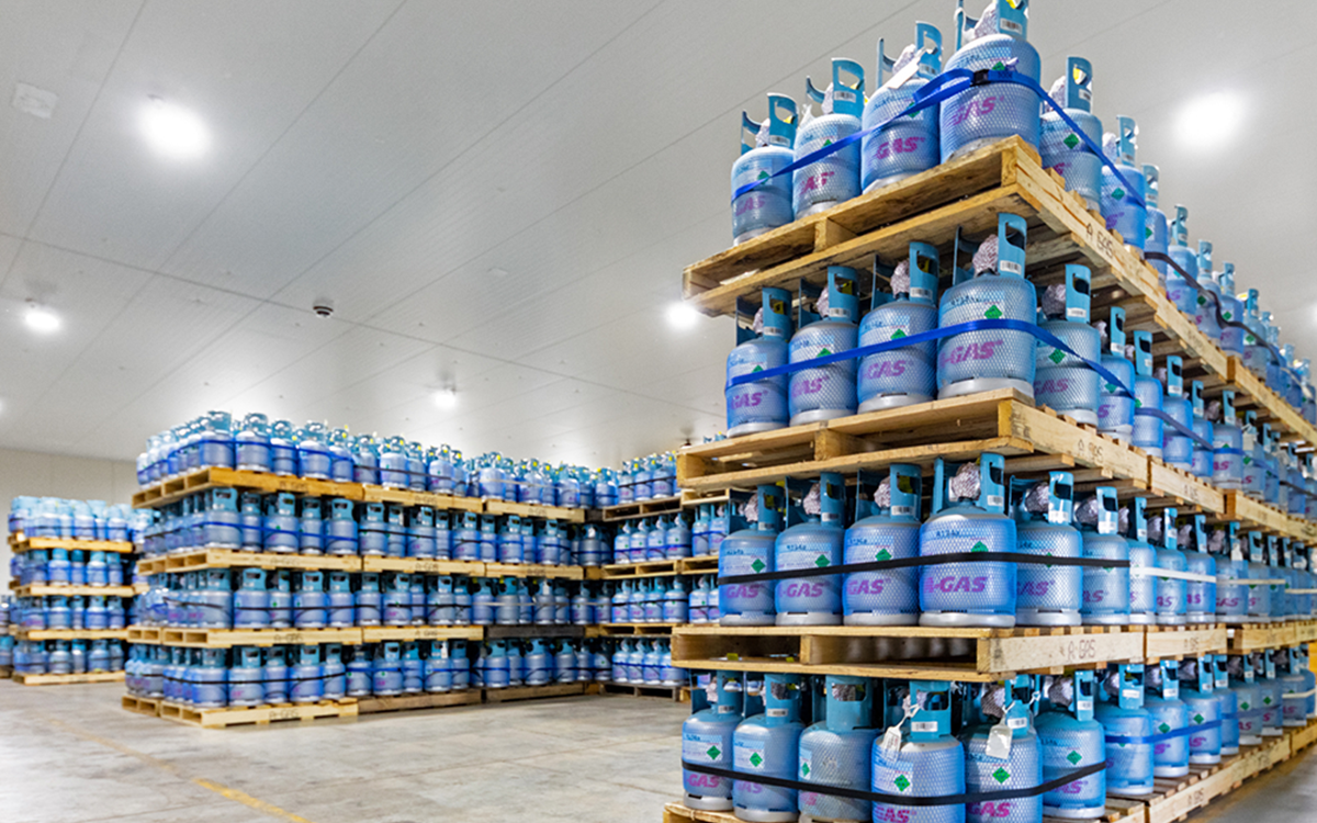 Palettes of gas cylinders stacked on top of each other